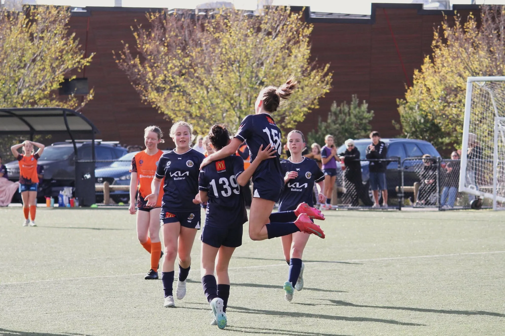 Ballarat City junior girls celebrating a goal
